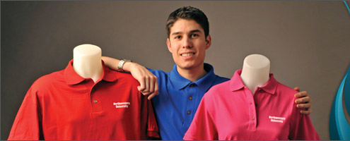 Alex, Amsterdam Printing's employee, is wearing a blue custom polo shirt