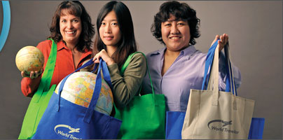 Amsterdam Printing employees holding promotional bags